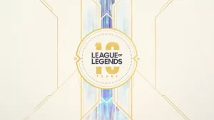 White and gold designed background with League of Legends 10 Years emblem in center